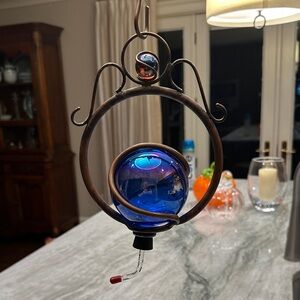Hummingbird art glass feeder with copper accents and copper hanger
